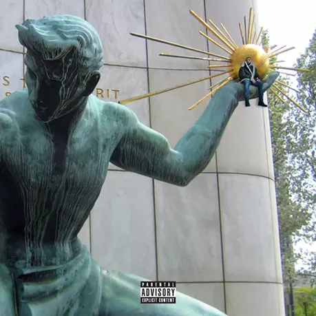 See what Drake looks like sitting on Detroit landmarks