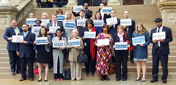 Michigan representatives who want an audit of DPS stand on the steps of the state Capitol. - FACEBOOK