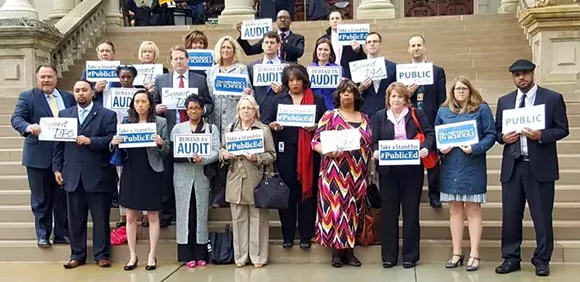 Michigan representatives who want an audit of DPS stand on the steps of the state Capitol. - Facebook