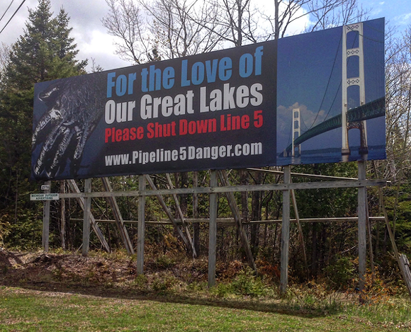 Billboards demanding the shutdown of Line 5 appeal to motorists on both sides of the Mackinac Bridge. - Photo by Lee DeVito