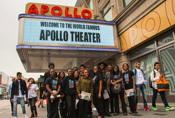 The Mosaic Youth Theatre group poses in front of New York's Apollo Theater. - PHOTO COURTESY MOSAIC YOUTH THEATER