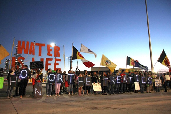 Protesters outside the Marathon oil refinery in Detroit on Monday. - Photo courtesy of Larissa Flora.