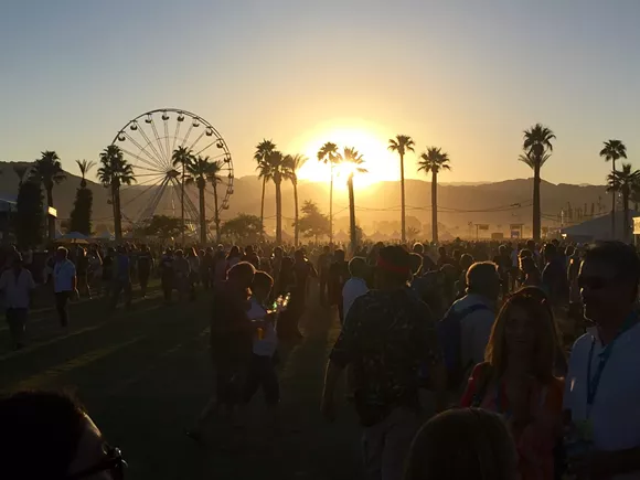 The sun sets over the Desert Trip festival in Indio, Calif. - Photo by Dustin Blitchok