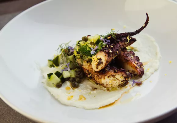 Za'atar-rubbed octopus with garlic, cucumber, and fresh herbs. - Photo by Janna Coumoundouros, Lilacpop Studio