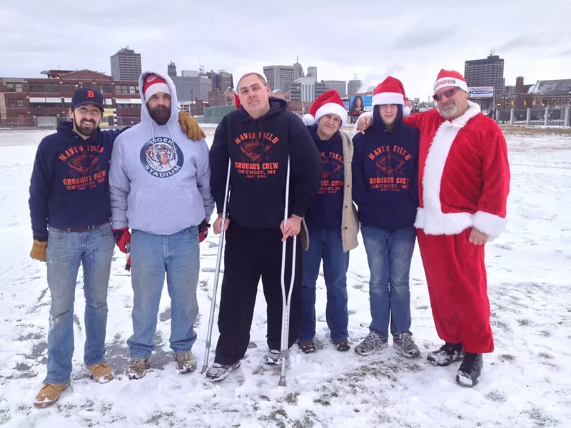 The Navin Field Grounds Crew at the abandoned Tiger Stadium site in Corktown on Christmas Day 2012. Joe Michnuk is at far right in his Santa suit. - Bruce Giffin