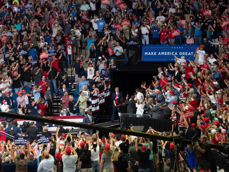 Trump at a rally in Tulsa, Okla., in June, where thousands of people gathered without wearing masks. - THRU_THE_GLASS, FLICKR CREATIVE COMMONS