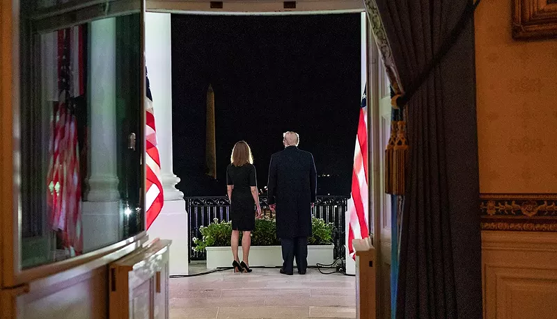 President Donald J. Trump and U.S. Supreme Court Associate Justice Amy Coney Barrett stand together on the Blue Room balcony Monday, Oct. 26, following Justice Barrett’s swearing-in ceremony on the South Lawn of the White House. - Public domain, The White House