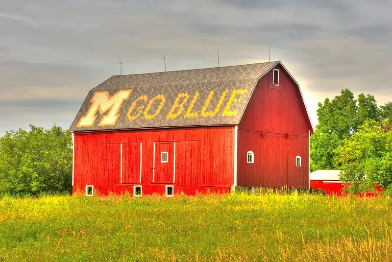 A barn with "M Go Blue" on the roof. - Wichai Cheva Photography / Shutterstock.com