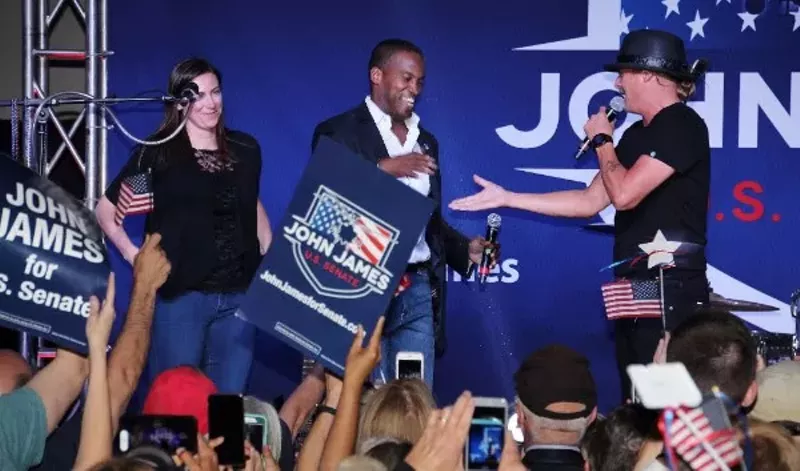 John James, center, who ran for U.S. Senate, was endorsed by Kid Rock, right, who didn't run for Senate but pretended to. - Courtesy photo