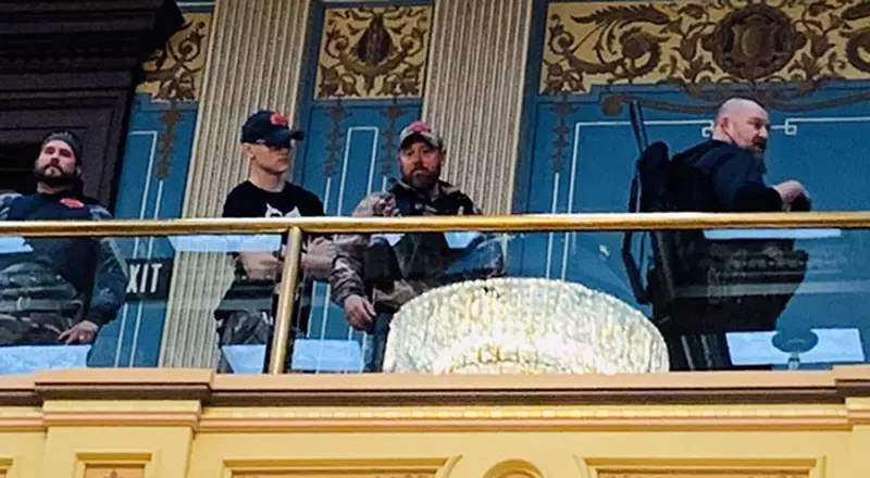 Armed protesters stormed the Michigan Capitol building in April 2020. - SEN. DAYNA POLEHANKI TWITTER ACCOUNT @SENPOLEHANKI