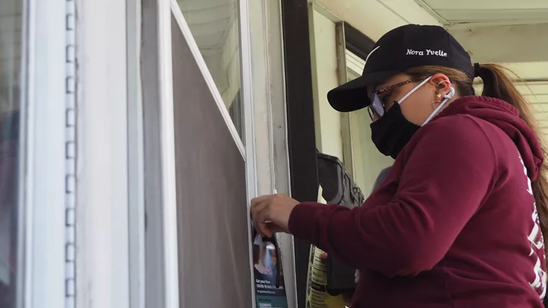 Nora Rodriguez is one of the dozens of canvassers going door-to-door to persuade Detroiters to get vaccinated for COVID-19. - SEAN TAORMINA