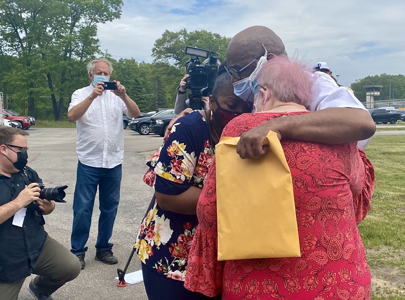 Ray Gray is greeted by his sister Phyllis Long and his wife, Barbara Rinehart-Gray, outside the walls of the Muskegon Correctional Facility, Tuesday May 25, 2021. - Dave Mesrey