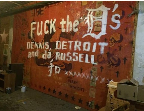 Anti-Dennis Kefallinos graffiti scrawled across a mural at the Russell Industrial Center - Facebook.