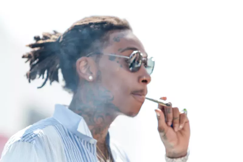 Rapper Wiz Khalifa. - Jamie Lamor Thompson / Shutterstock.com