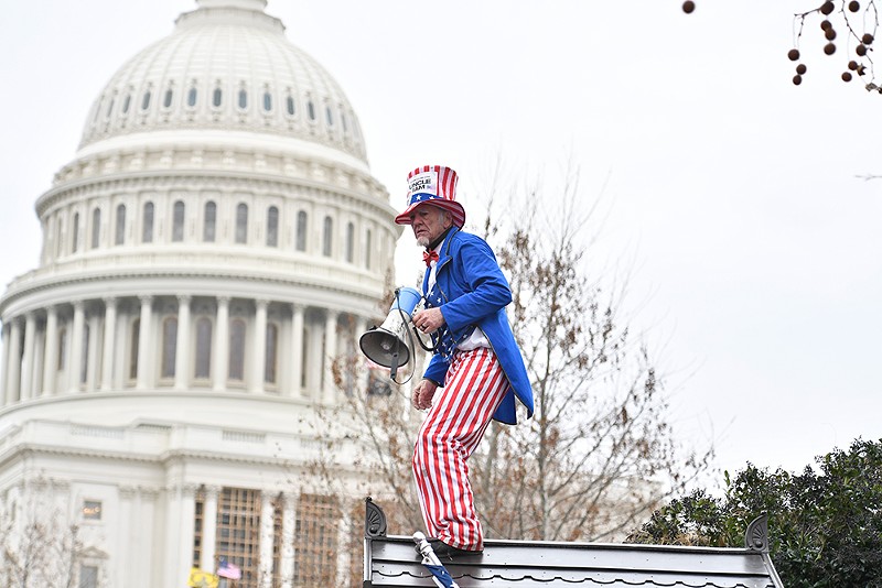 A rioter at the Jan. 6 insurrection dressed as Uncle Sam. - GALLAGHER PHOTOGRAPHY / SHUTTERSTOCK.COM