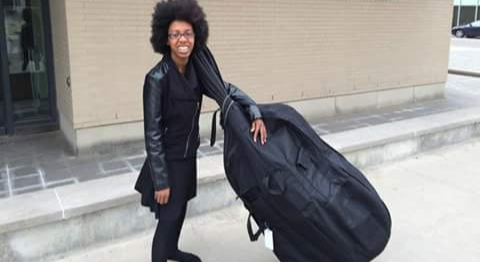 Robotics expert and upright bass player Zwena Gray will be just part of the all-female musical entertainment. - Photo courtesy IWDC