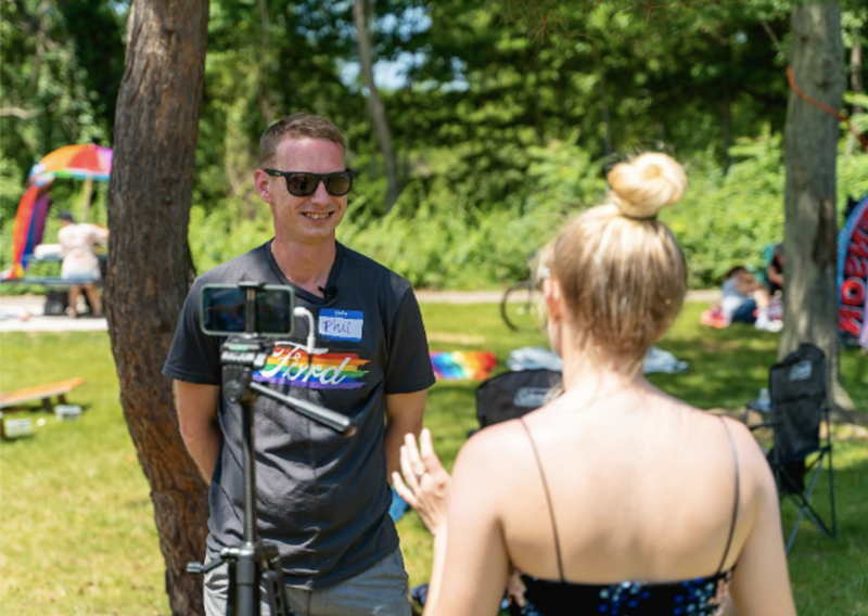 Macomb County Pride President Phil Gilchrist completing an interview during a Pride Picnic in Sterling Heights, June 2021. - Courtesy of Macomb County Pride