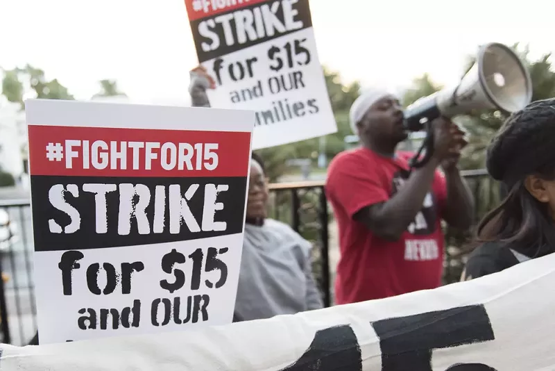 Demonstrators gather for a Fight for $15 protest outside of McDonald's restaurant in Las Vegas. - Jason Ogulnik / Shutterstock.com