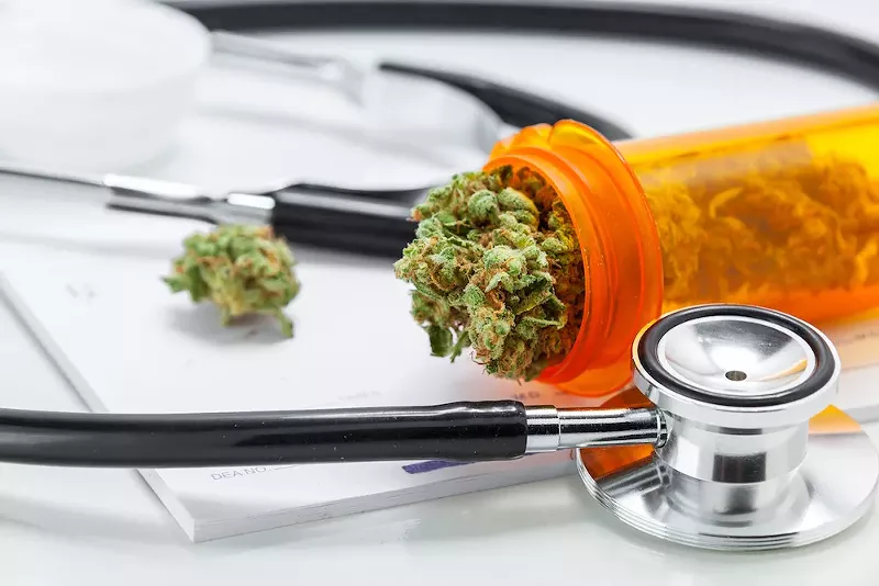 A doctor in Northern Michigan is suspended for two years after it was revealed he approved 22,000 medical marijuana applications in 12 months. - Shutterstock.com