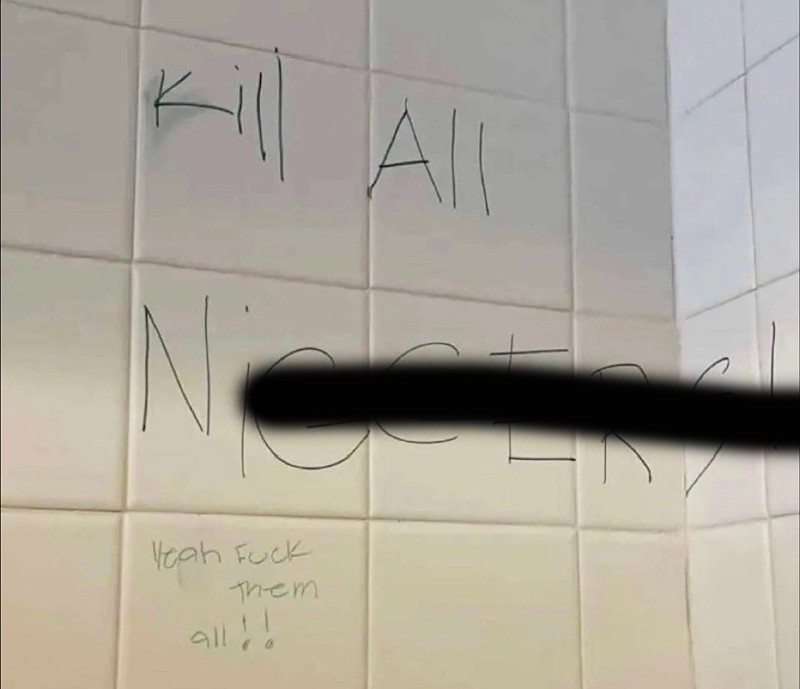 Racist graffiti scrawled on a bathroom wall in Bloomfield High School. - BLOOMFIELD HILLS HIGH SCHOOL PARENT