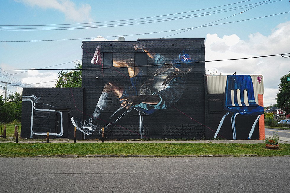 "Evocative of Ingenuity" by Bakpak Durden (2021); wall painting; 952 Clay St. Detroit. - LAMAR LANDERS FOR BLKOUT WALLS