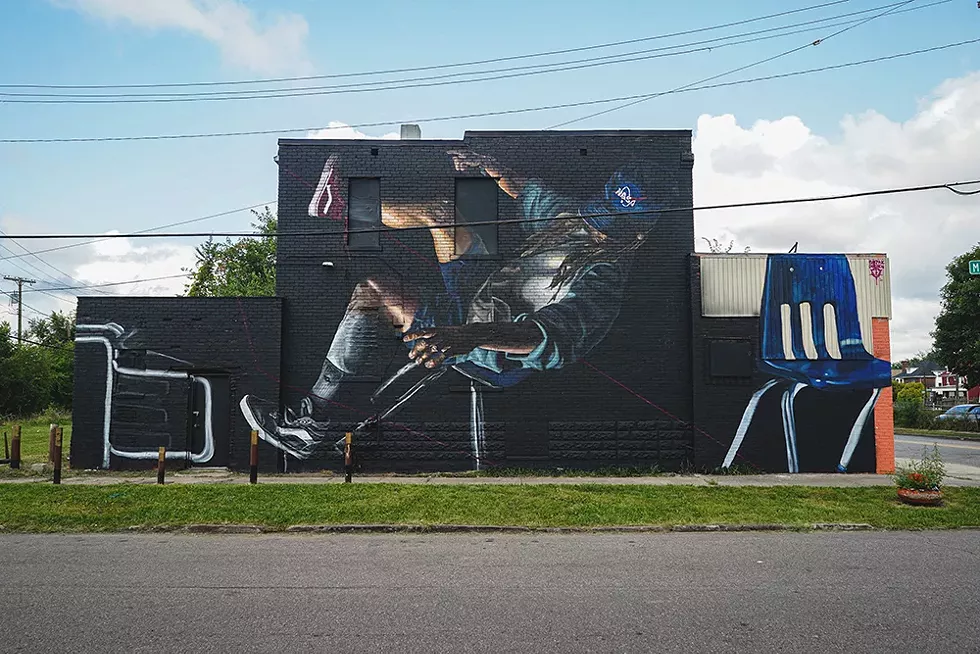 "Evocative of Ingenuity" by Bakpak Durden (2021); wall painting; 952 Clay St. Detroit. - Lamar Landers for BLKOUT Walls