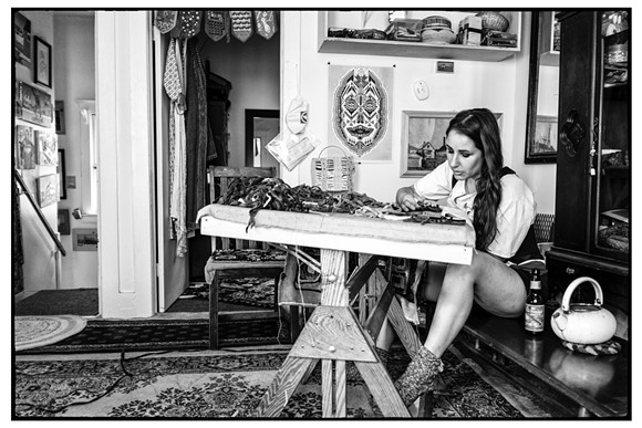 Wood at work in her Hamtramck home studio. - Photo by Roy Feldman