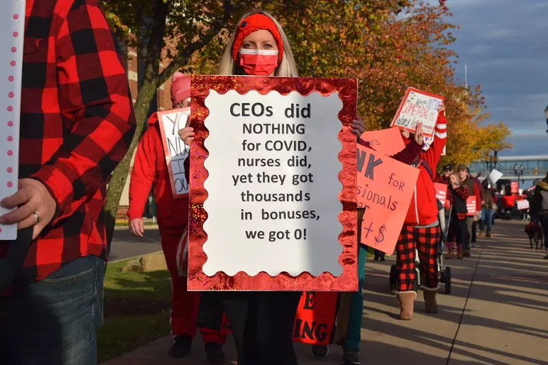 Sparrow Hospital workers call for fairer pay and better benefits during an “informational picket.” | - Anna Gustafson / Michigan Advance