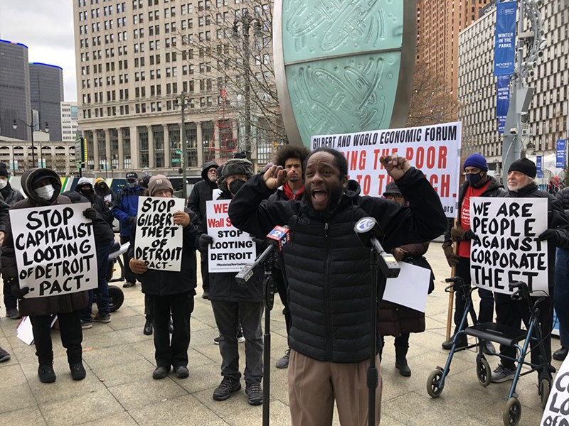 Tristan Taylor, organizer for Detroit Will Breathe, speaks at a rally against the World Economic Forum in downtown Detroit. - STEVE NEAVLING