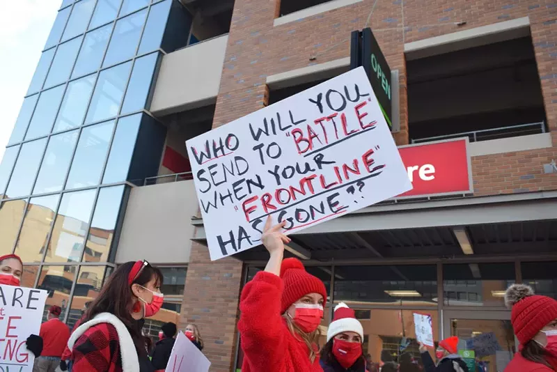 Sparrow Hospital workers call for fairer pay and better benefits at an “informational strike.” - Anna Gustafson