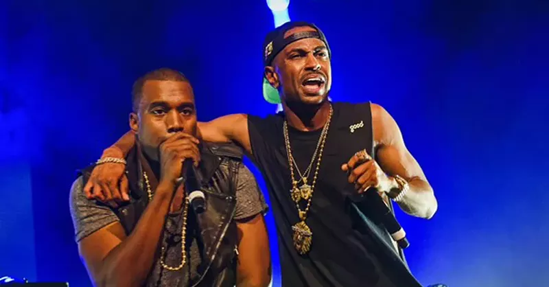 Kanye West and Big Sean performing together in 2012. - Doug Coombe