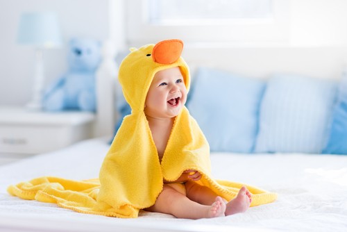 Today's infant is flexible about being born: "I am ready to be born so I can complete this family. Or you guys can totally not have me. It's cool either way." - Photo courtesy Shutterstock