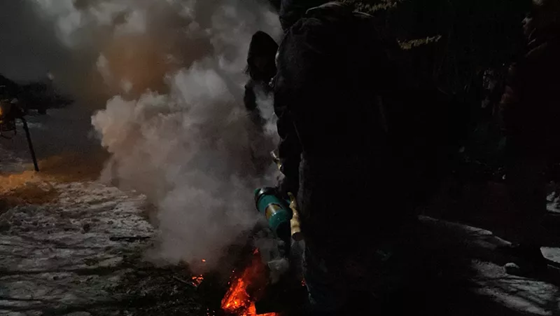 Police gave gatherers only two minutes to extinguish their ceremonial fire and leave the park. - Courtesy of Rosa María Zamarrón