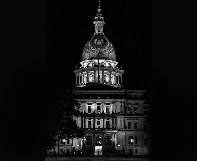 Lansing State Capitol Building in Michigan under the cover of darkness. - McKeeDigital, Shutterstock