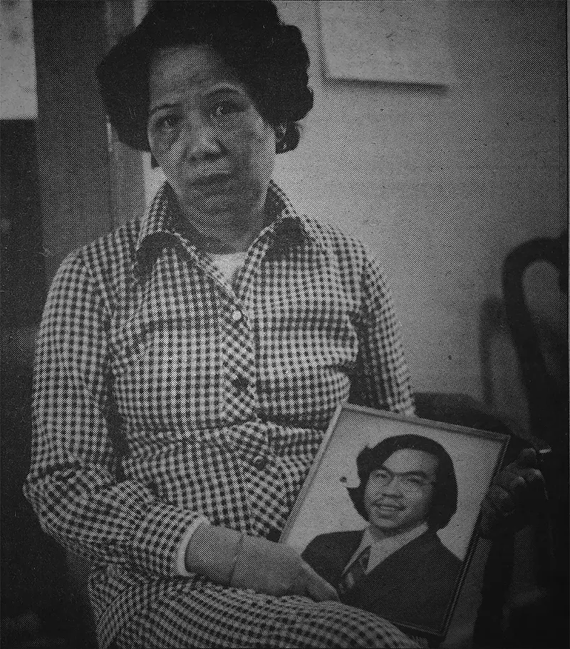 Lily Chin holds a picture of her son, Vincent. - Helen Zia