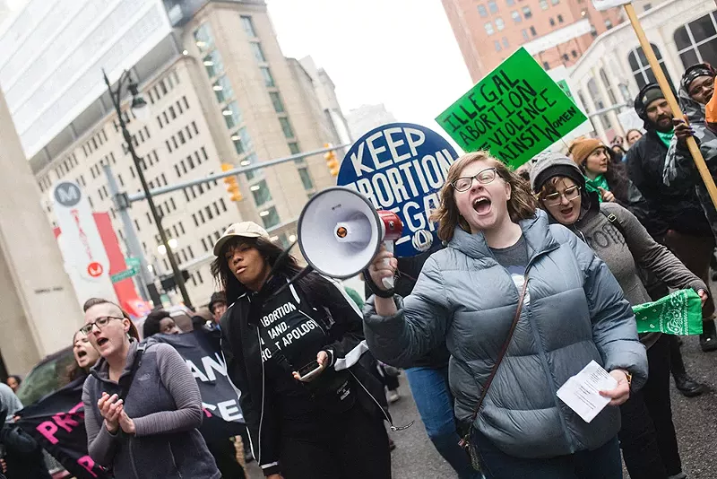 Protesters march in the streets of Detroit the day after a leak draft was published indicating that the U.S. Supreme Court would soon move to overturn Roe v. Wade. - Viola Klocko