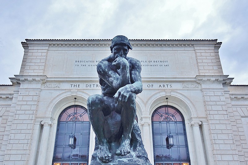 "The Thinker" sculpture by Auguste Rodin ponders outside the Detroit Institute of Arts. - EQRoy / Shutterstock.com