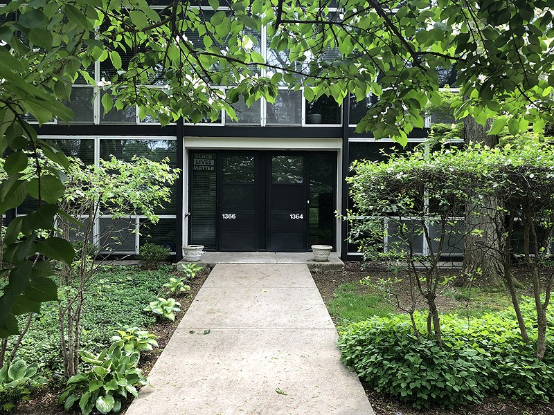 There’s an unconventional art gallery tucked inside a Mies van der Rohe-designed townhome in Detroit. - LEE DEVITO