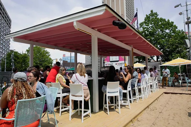 Downtown Detroit's new BrisaBar is outdoors in Campus Martius Park, surrounded by sand. - The Iconic Collection