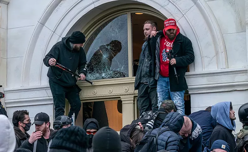 For 18 months, politicians who cowered during the riot at the U.S. Capitol have downplayed its significance. - Shutterstock