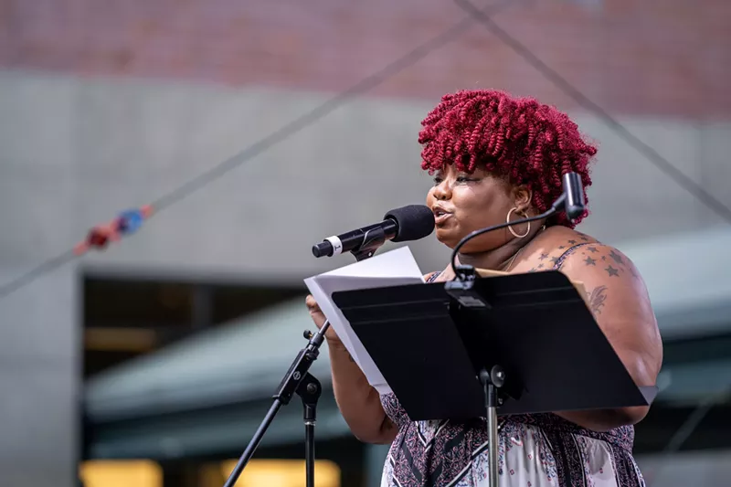Poetry and Music host La Shaun phoenix Moore. - Detroit Symphony Orchestra