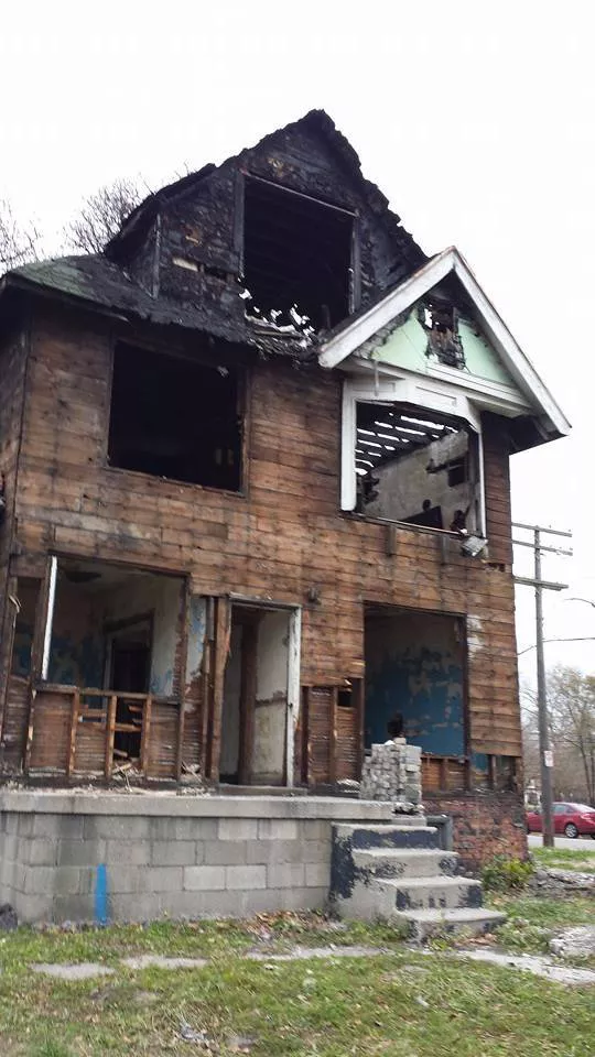 This was the blighted, fire-ravaged house before it was torn down.