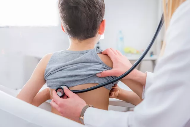 Child examined by doctor - Adobe Stock