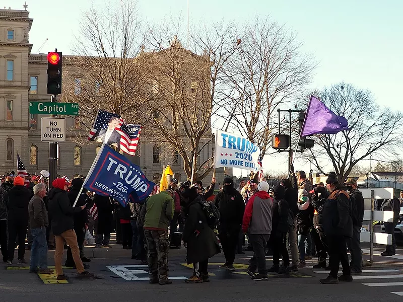 Trump supporters protest against the presidential elections results in front of Michigan Capitol in 2020. - Shutterstock