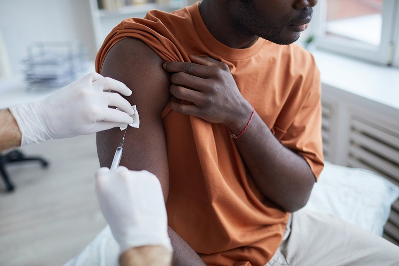 According to the Centers for Disease Control and Prevention, in June 2022 unvaccinated people had twice the risk of testing positive for COVID-19 and eight times the risk of dying. - Shutterstock