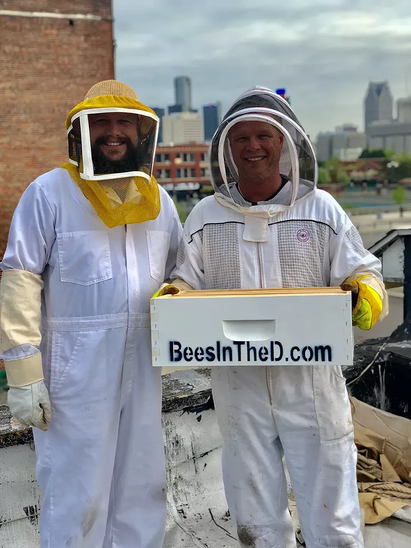 Bees in the D co-founders Brian Roest-Peterson and Brian Peterson-Roest have more than 200 beehives at about 70 locations across southeast Michigan, including on Detroit rooftops. - Courtesy photo
