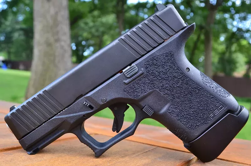 A 9mm "ghost gun" assembled from parts made using a 3D printer. - Shutterstock