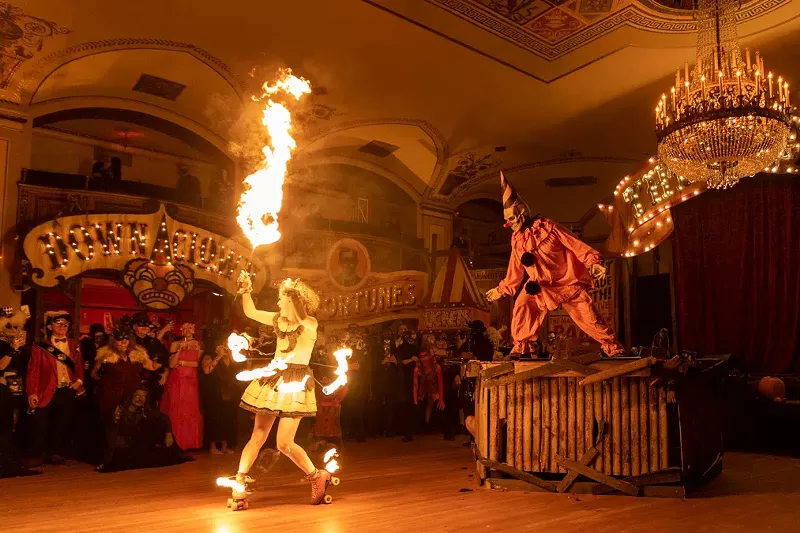 Zombo the Clown and a fire dancer at Detroit's popular Halloween event Theatre Bizarre. - Josh Justice