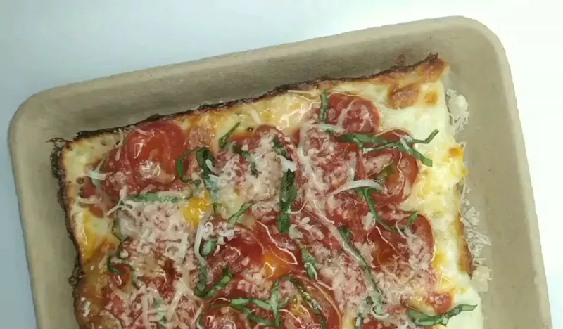 Joe Maino of the Slim Saucy’s pop-up learned how to make Detroit-style pizza under the award-winning Shawn Randazzo of St. Clair Shores. - Instagram, @slimsaucys