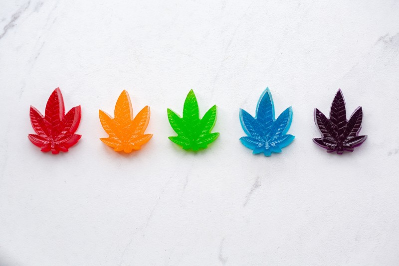 THC-infused gummies in the shape of a cannabis plant. - Shutterstock